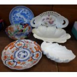 A Japanese Imari bowl and two oriental dishes,