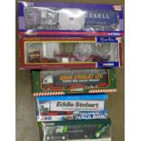 Five Corgi die-cast model vehicles, CC13234 DAF, CC13102 Volvo, 59504 Volvo Eddie Stobart,