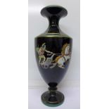 A Victorian black glazed vase, restoration to base, 37.