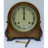 An Elliott walnut mantel clock marked Tarratt,