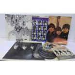 Four Beatles LPs comprising A Hard Day's Night, Revolver,