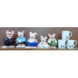 A set of five Wade Nat West pig money banks and three Wade Nat West bank mugs (8)