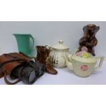 A treacle glaze jug, two teapots including Sadler and Arthur Wood,