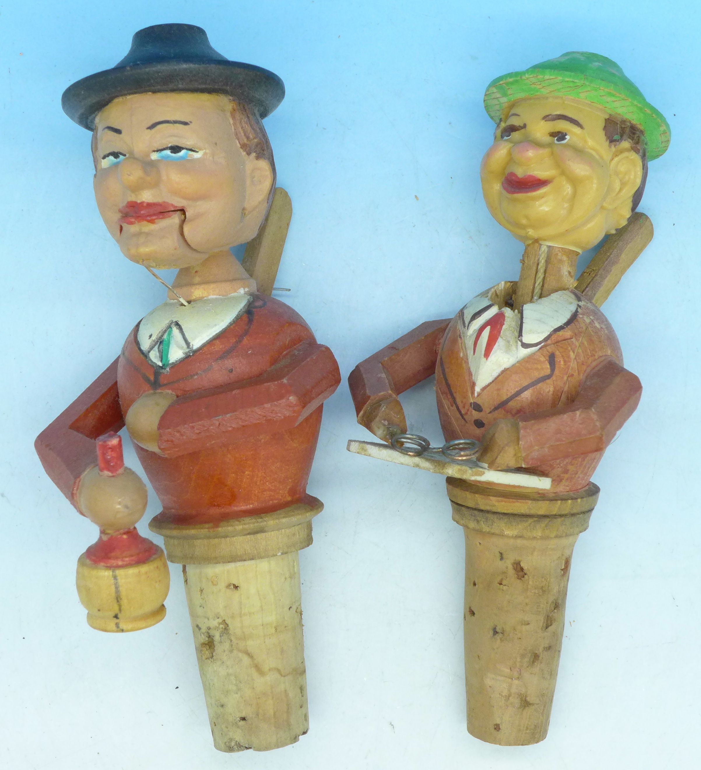 A pair of novelty Black Forest wine stoppers