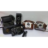 Eight cameras, Kodak Retinette, Olympus, Agfa, etc.