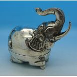 An Eastern white metal elephant trinket box,