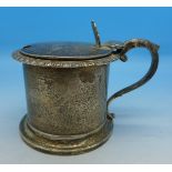 A Victorian silver mustard, London 1855, with liner,