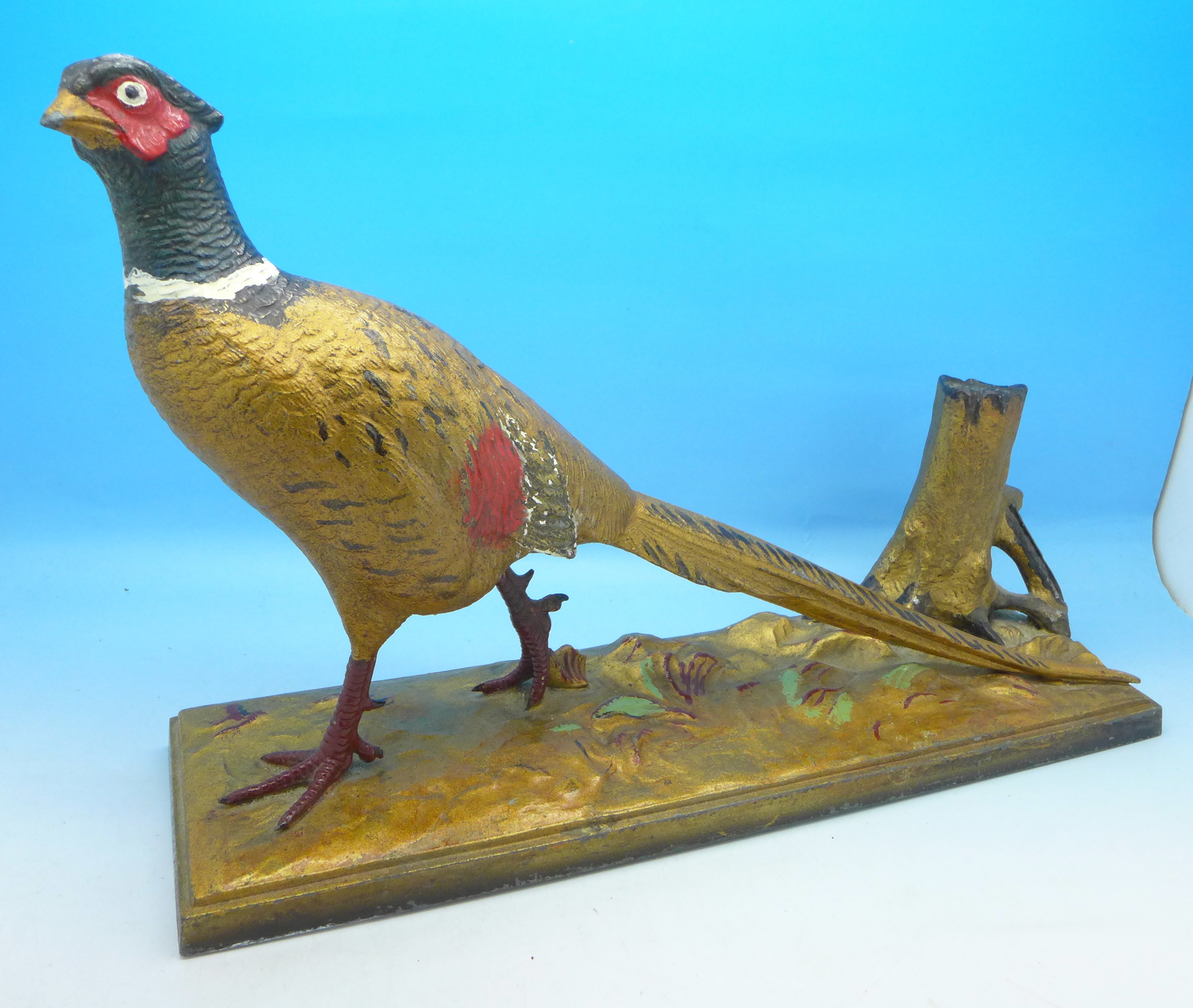 A large cold painted pheasant match striker, length of base 30.