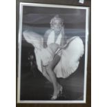 A large 3D Marilyn Monroe picture mounted on a mirror