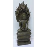 A Buddhist/Hindu bronze Naga multi headed figure,