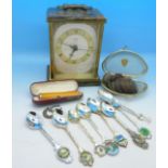 A Metamec quartz mantel clock, British coins, mainly pennies, an amber cheroot holder with gold rim,