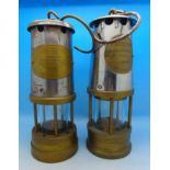 Two miner's lamps,