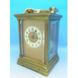 A French brass four glass sided carriage clock with striking movement,