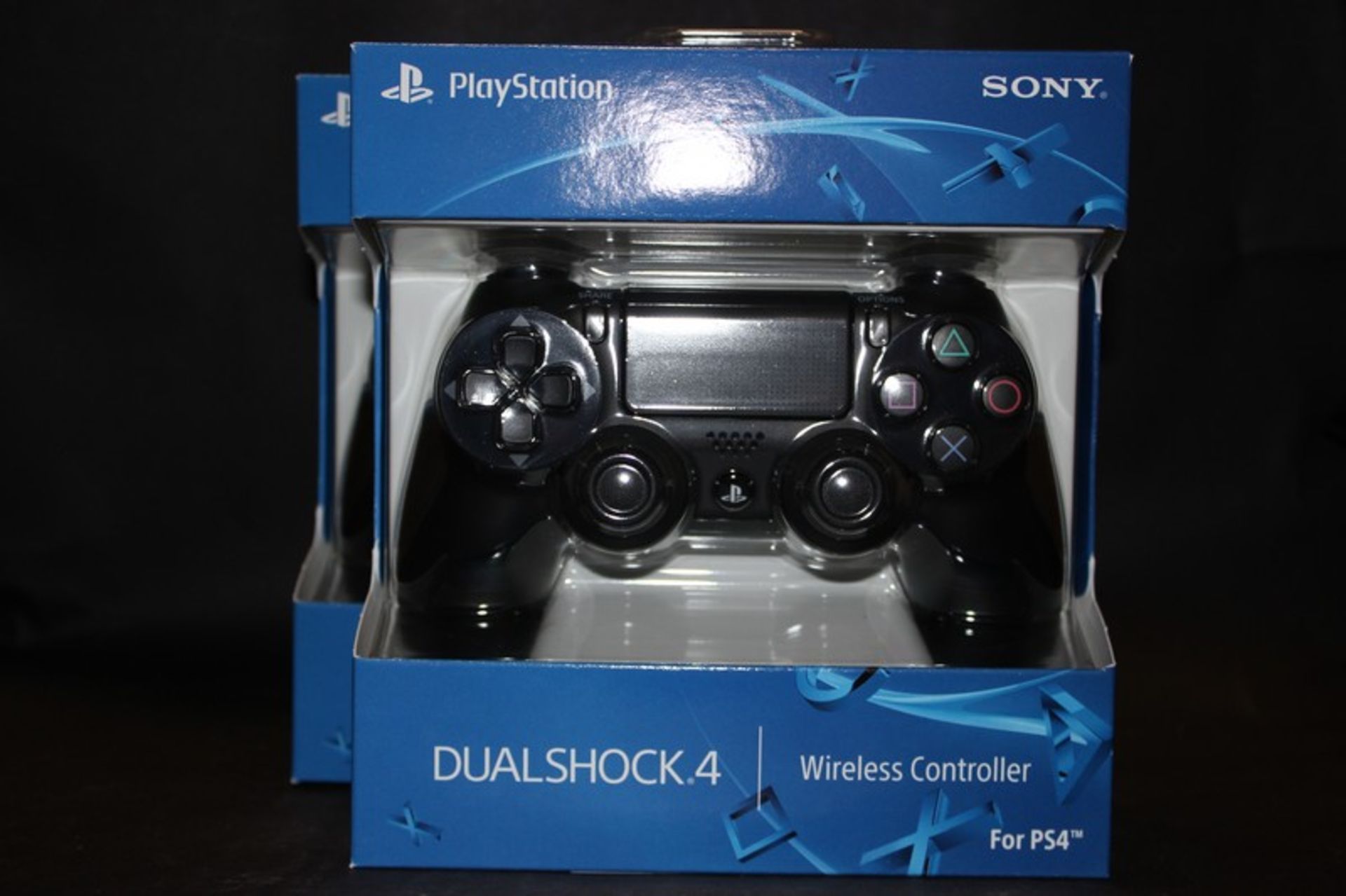 Two PlayStation 4 wireless DualShock controllers (Boxed as new).