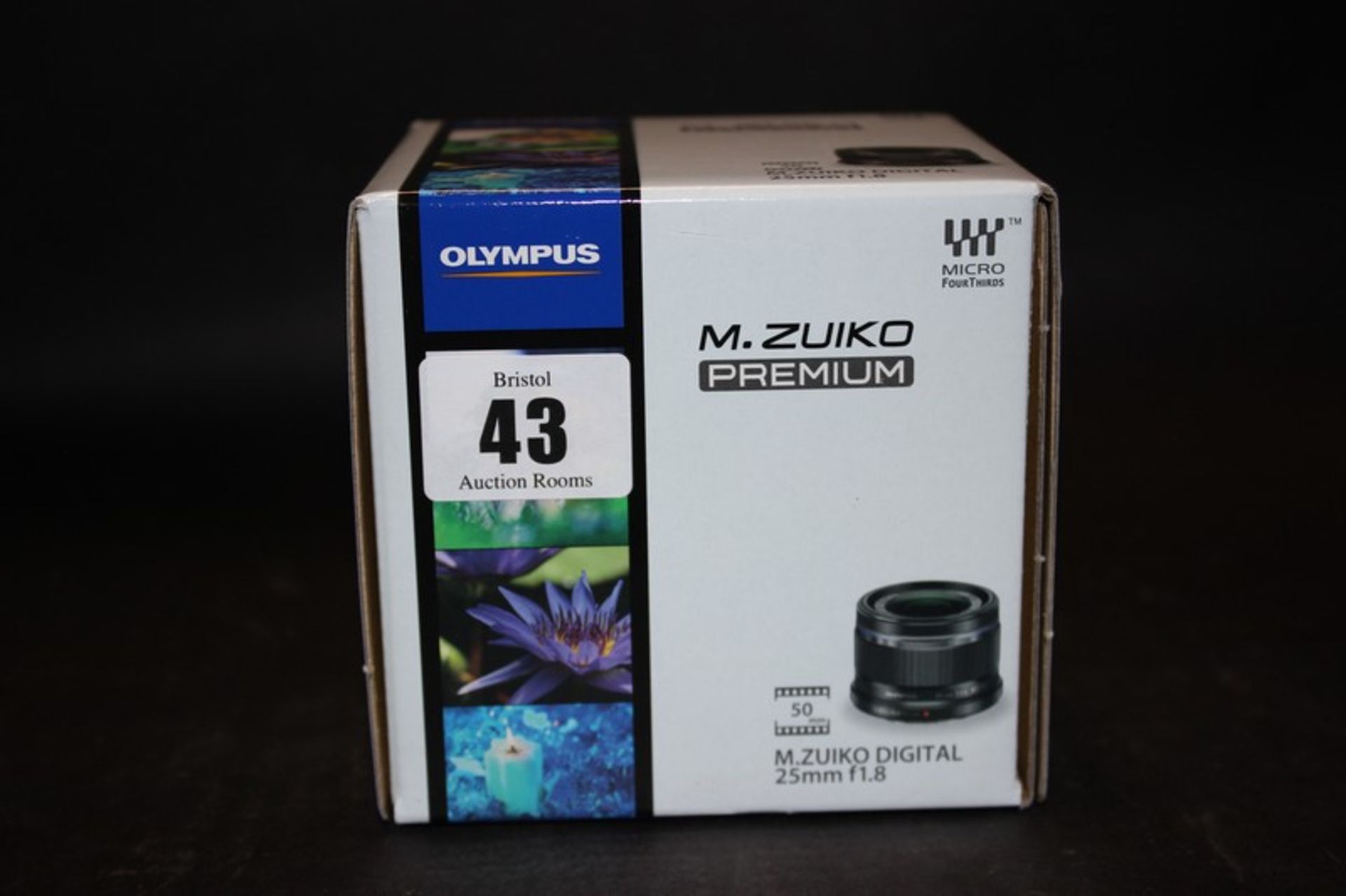 An Olympus M.Zuiko digital 25mm f1.8 (Boxed as new).