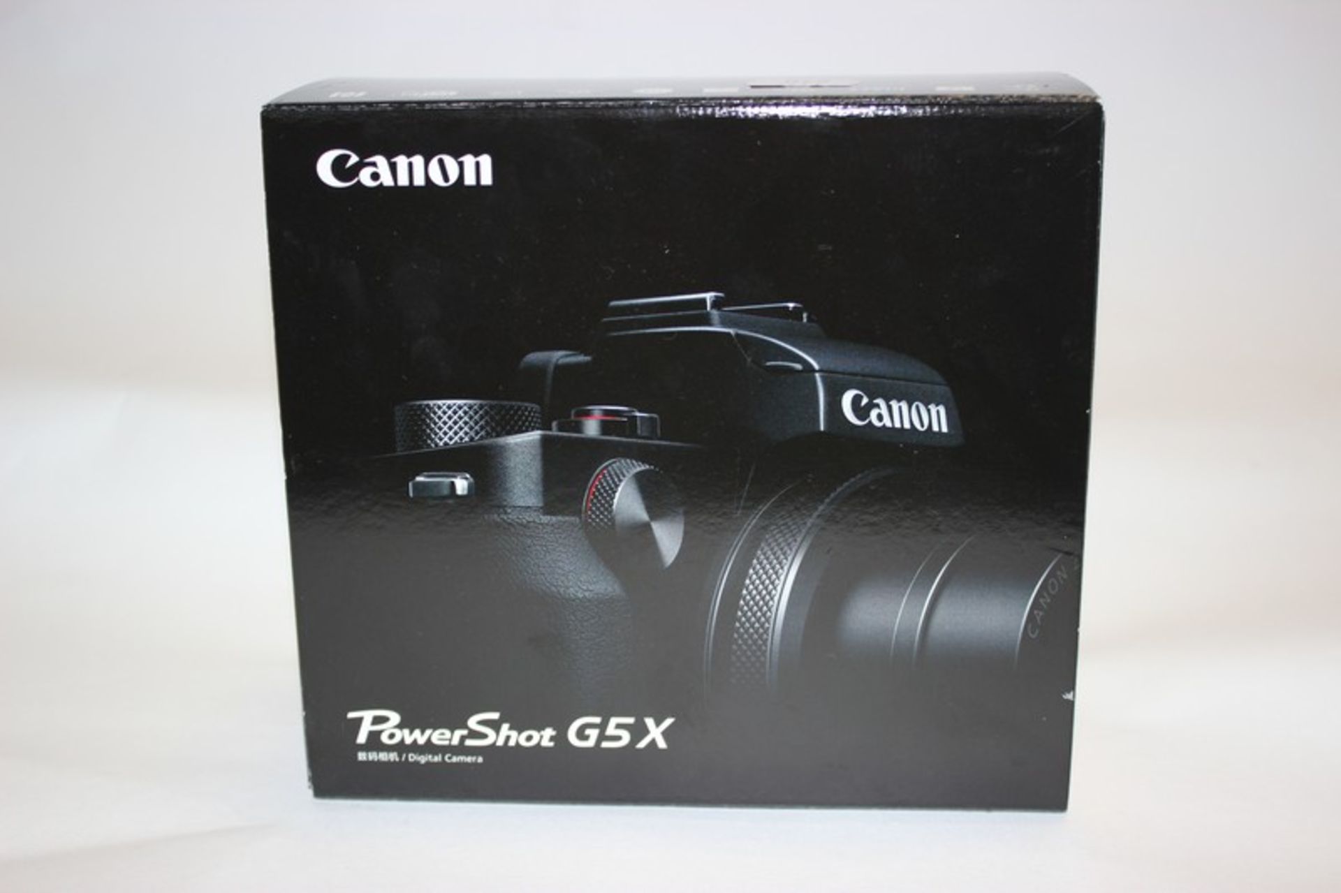 A black Canon Powershot G5 X digital camera (Boxed as new).