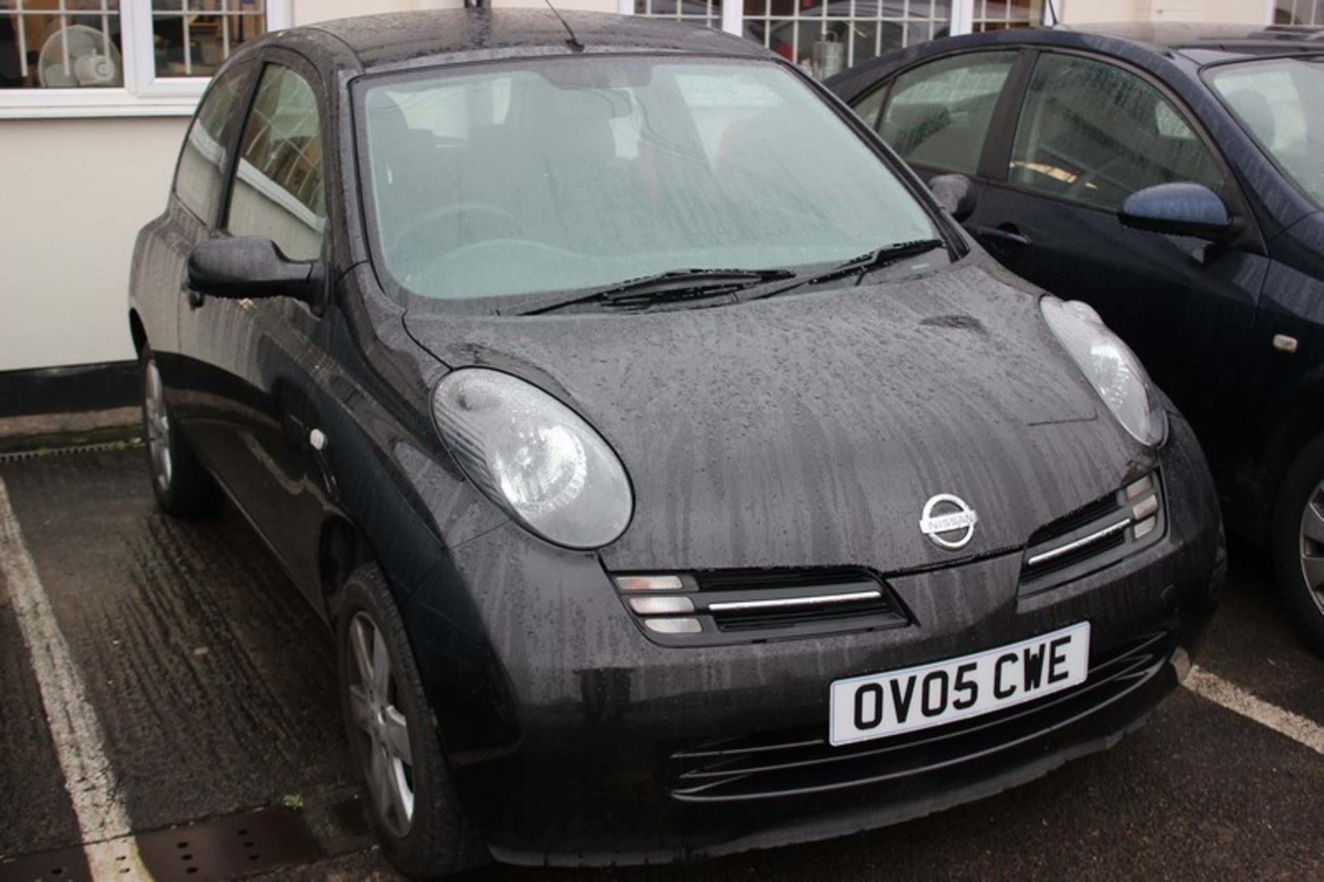 A 2005 Nissan Micra Urbis three door hatchback, registration number OV05 CWE, 1240cc, petrol,