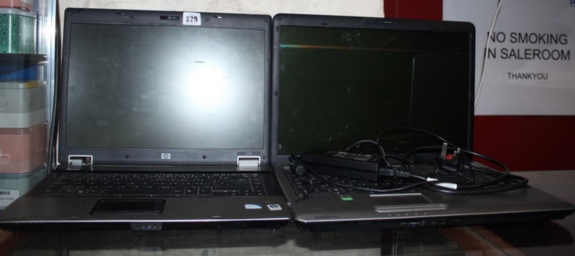 A Toshiba Satellite Pro P300-276 with charger (Hard drive removed) and a HP Compaq 6730b laptop (