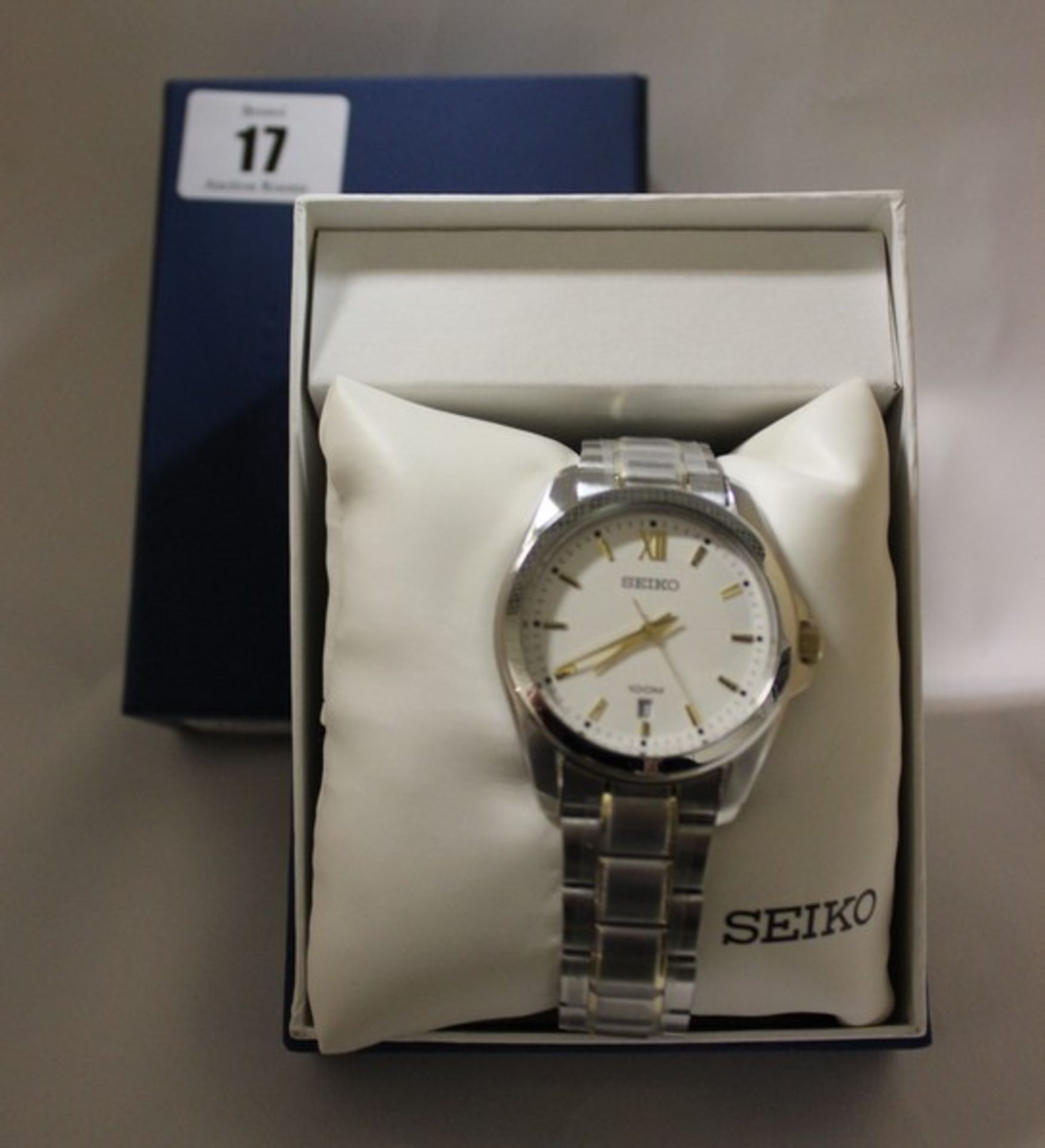 Three men's Seiko classic silver steel bracelet and case mineral watch SGEG63P1 (Boxed as new).