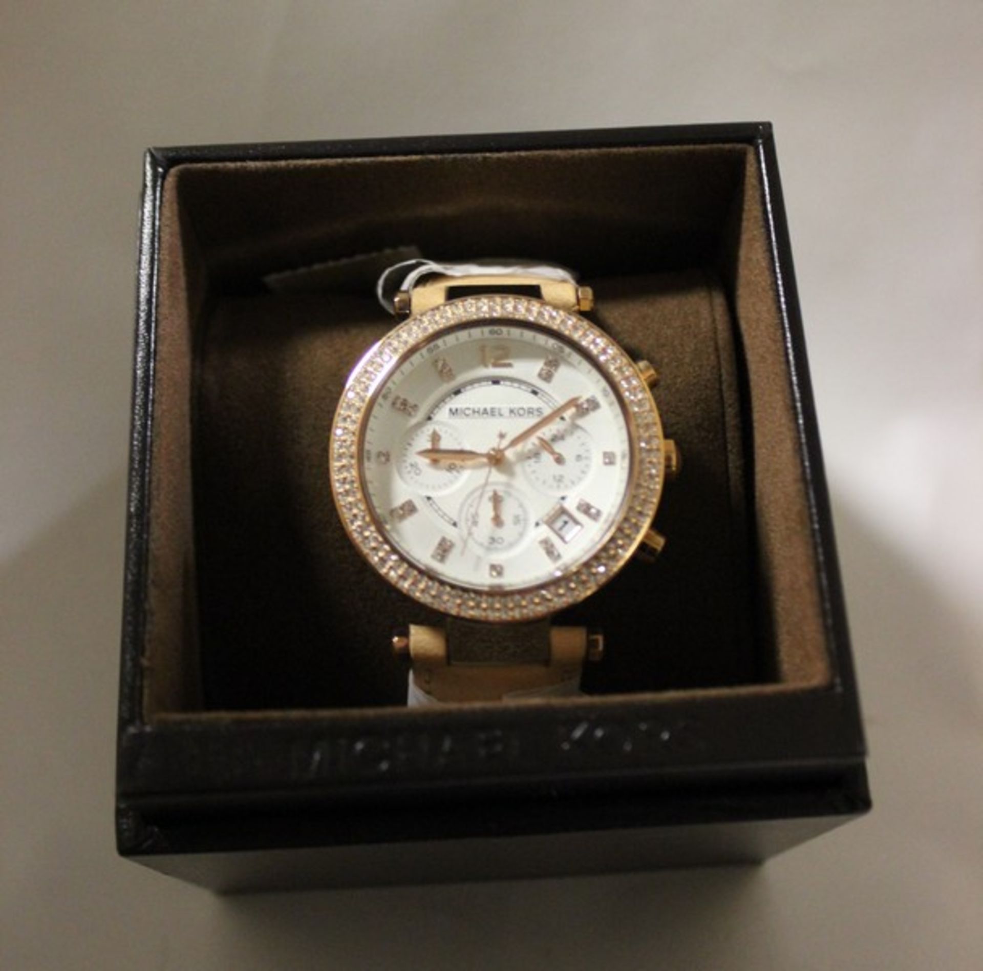 A ladies Michael Kors parker leather chronograph watch MK5633 (Boxed as new).