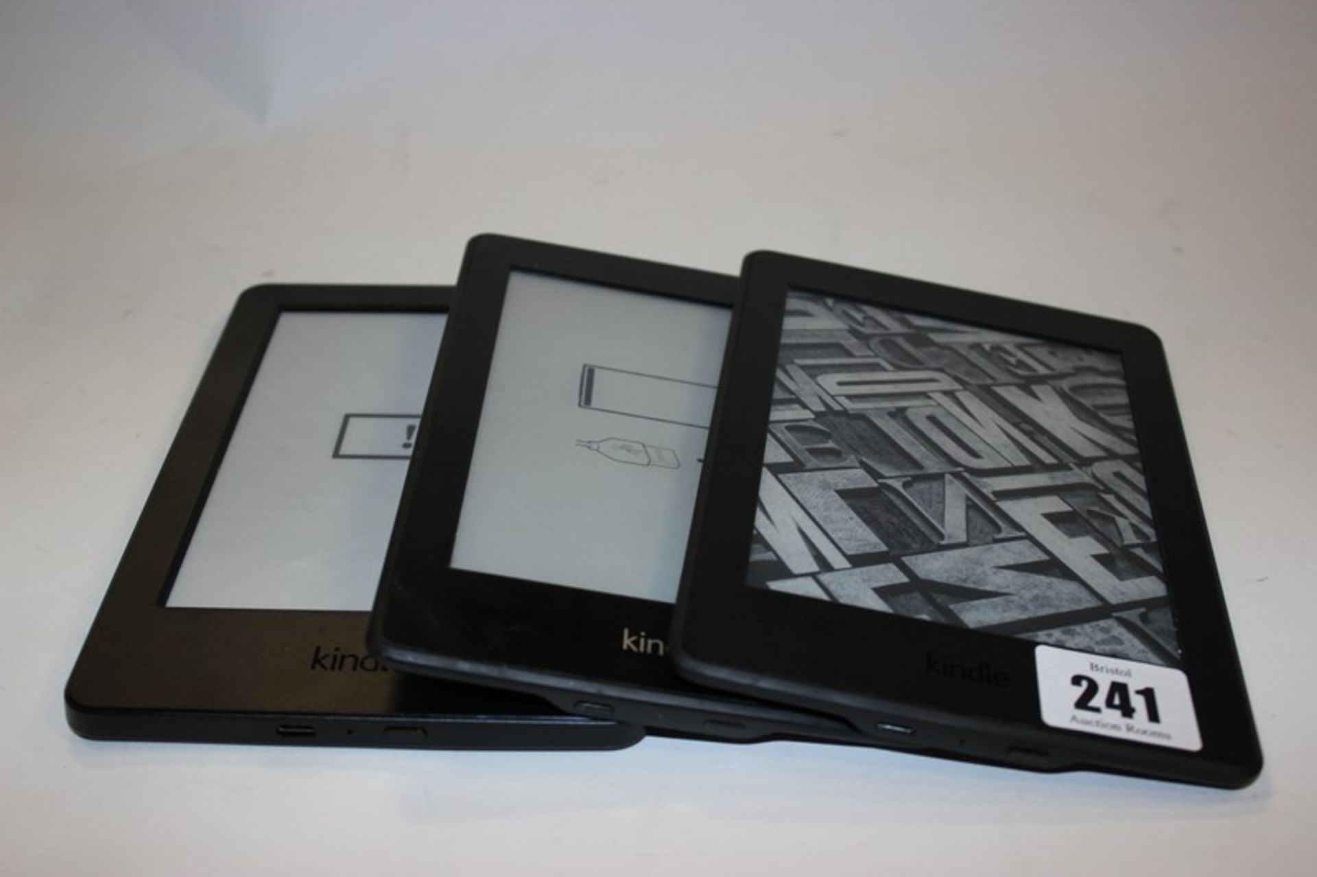 A Kindle Paperwhite 3G and WI-FI model: EY21, Kindle Paperwhite 3 (2015) model: DP75SDI and a Kindle