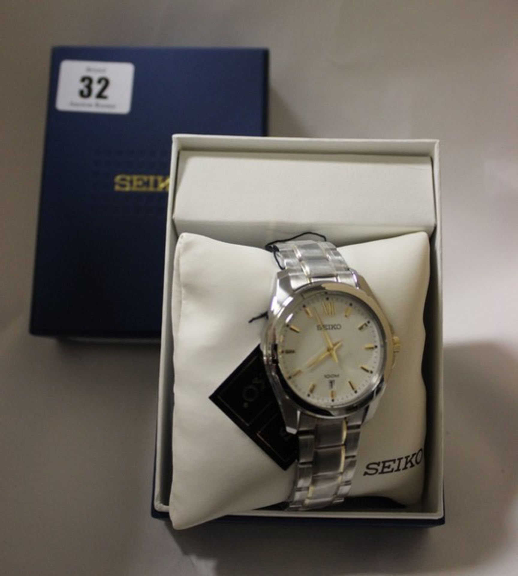 Four men's Seiko classic silver steel bracelet and case mineral watch SGEG63P1 (Boxed as new).