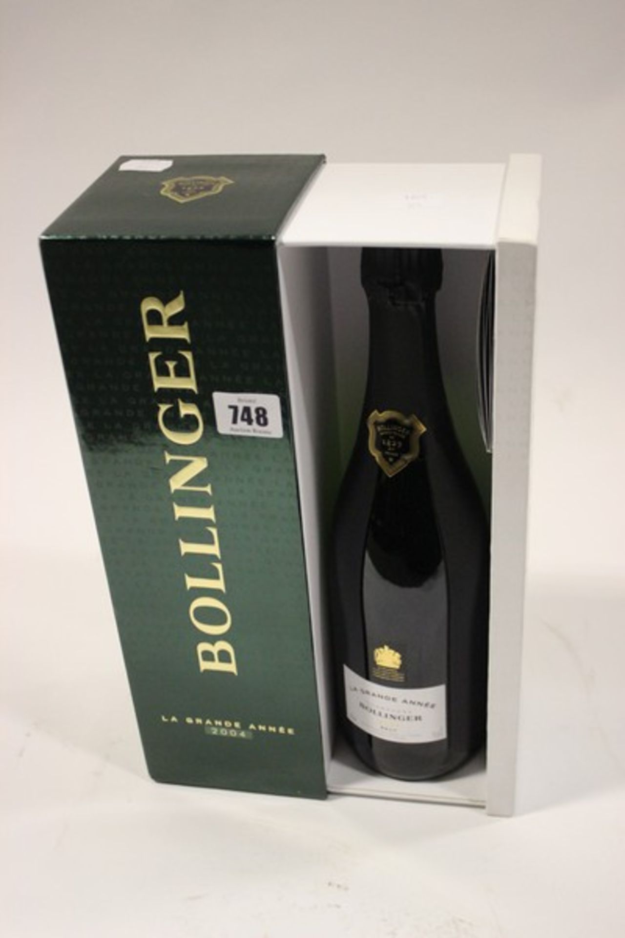 A bottle of Bollinger La Grande Annee 2004 Brut champagne in box (Over 18s only).