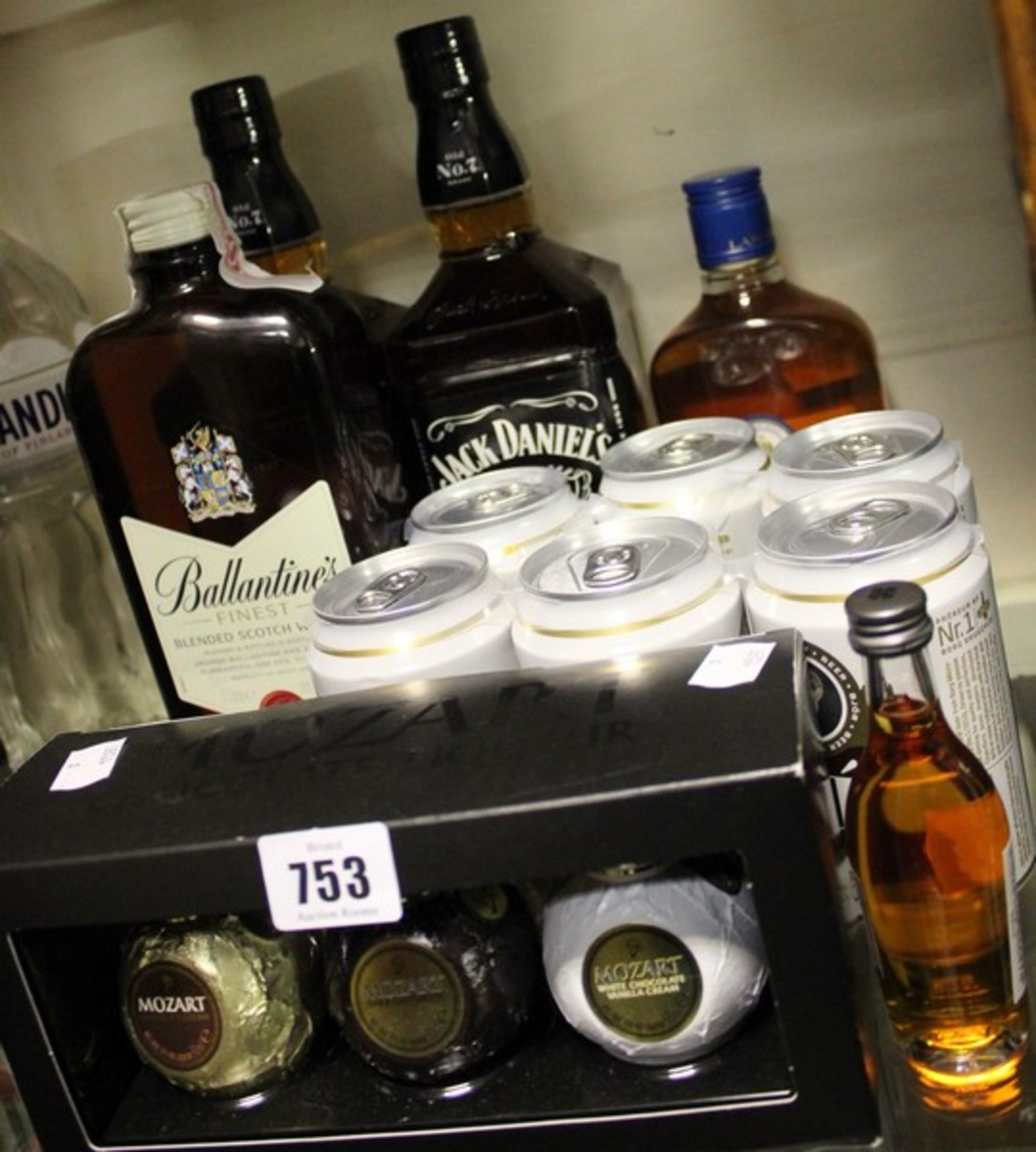 Two Jack Daniels whiskey (2x 1ltr), Ballantine's finest whisky (1ltr), Larsen cognac (500ml), set of