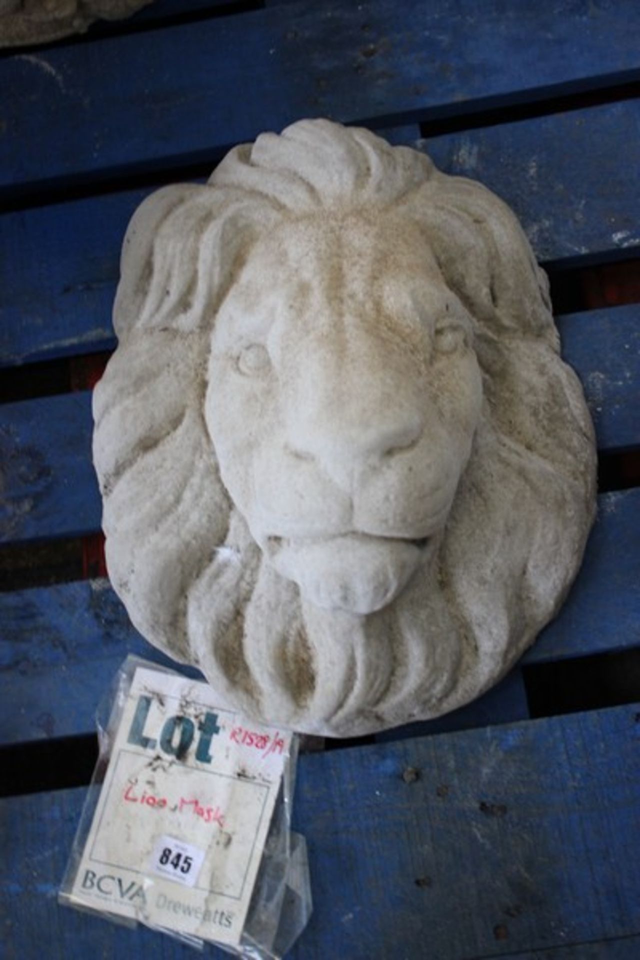 A stone Lion head.