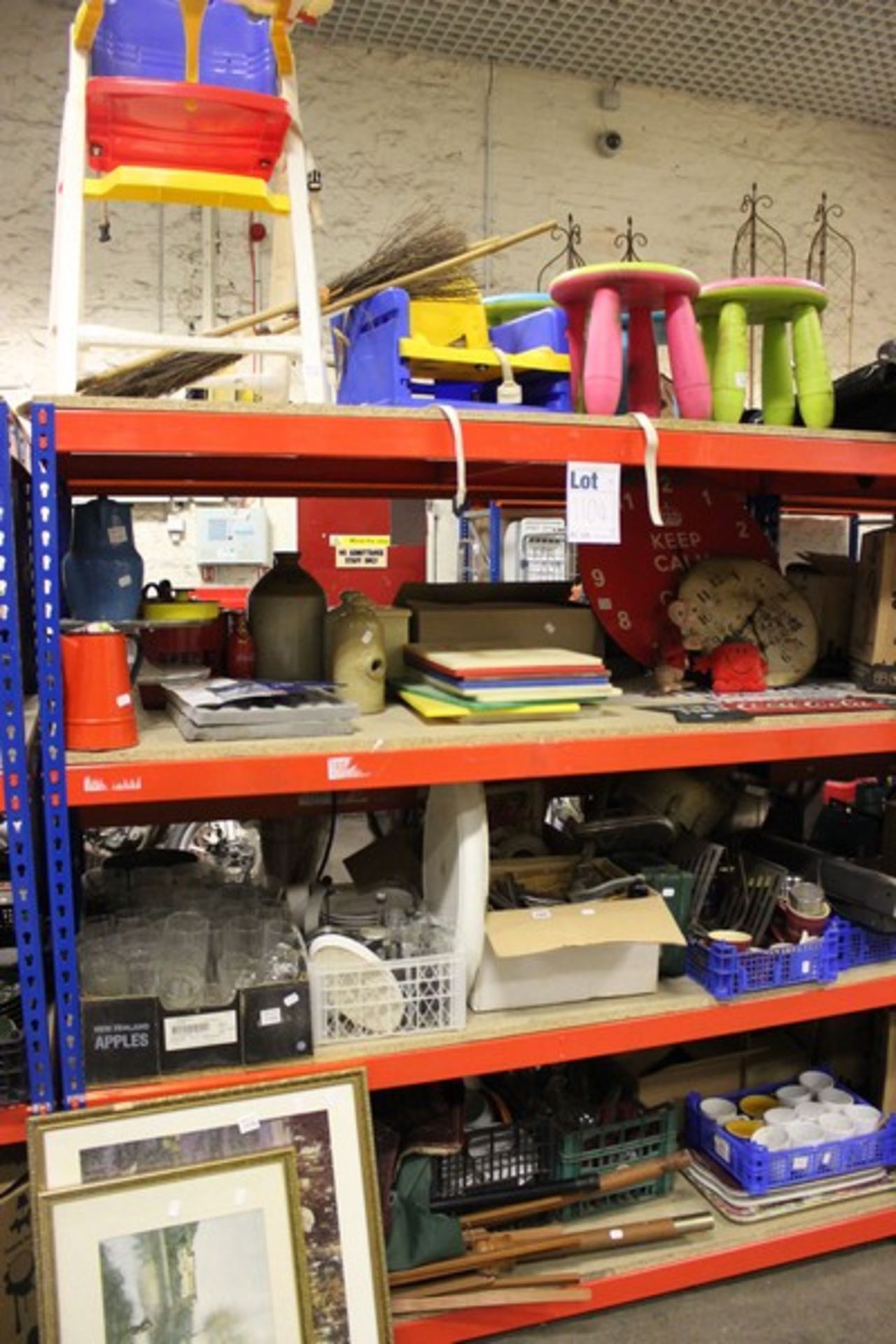 A quantity of crockery/glassware, café signs, two wall clocks, a vacuum, chefs knives, cutlery, high