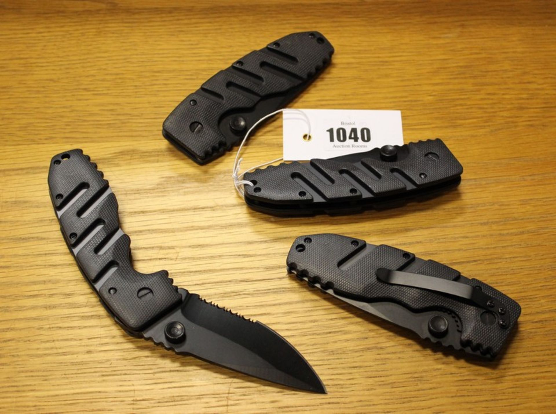Four new British Army folding knives (Over 18s only).