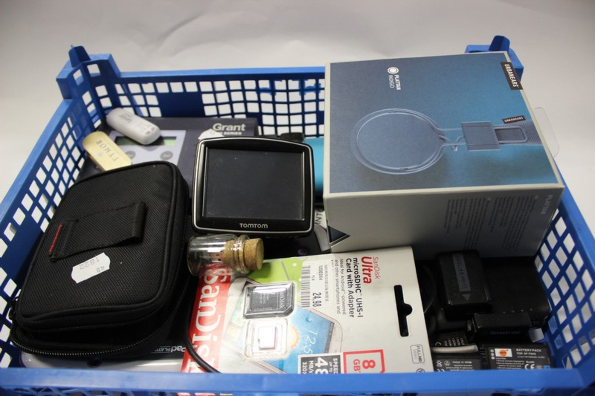 A quantity of powerbanks, camera batteries and two TomTom's etc.