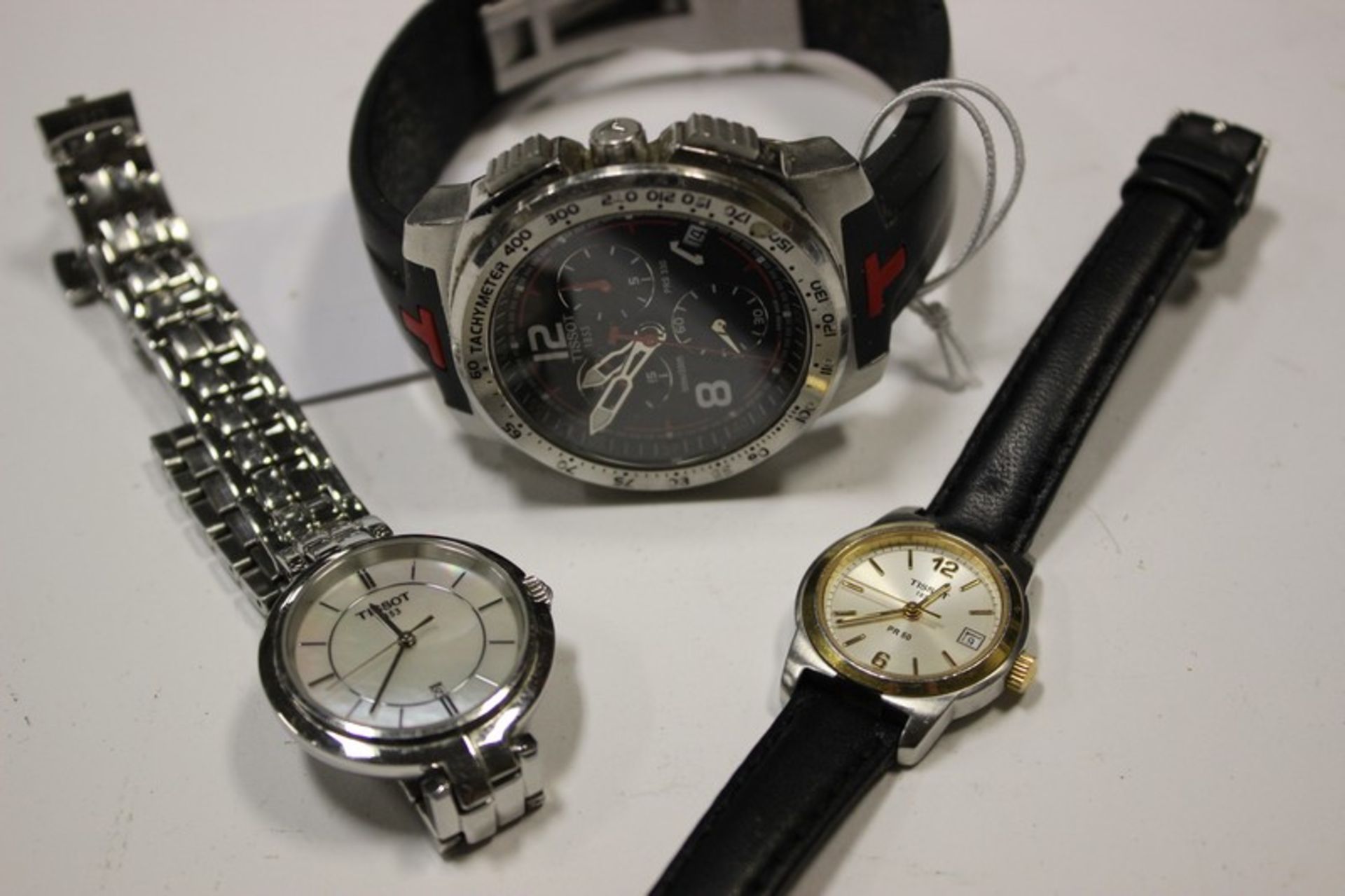Three Tissot watches to include; PRS 330, PR 50 etc.