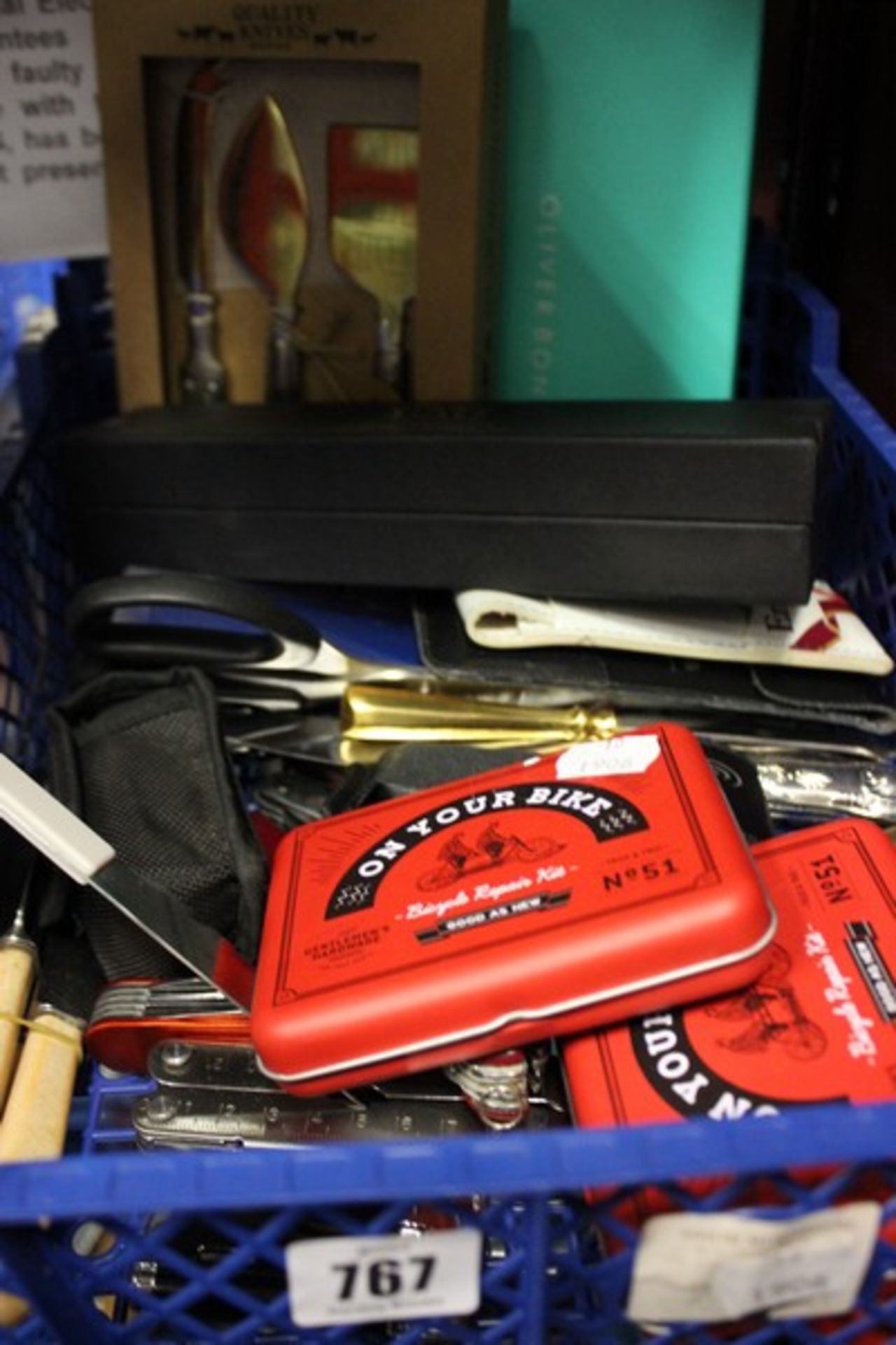 A quantity of assorted knives, multi-tools, kitchen utensils (Boxed as new), bike tool kits (As