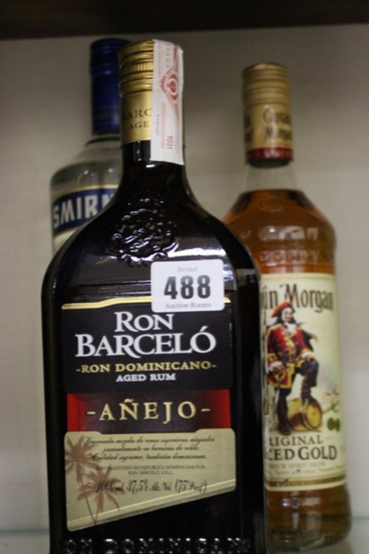 Ron Barcelo Anejo rum (1ltr), Captain Morgan Original Spiced Gold rum (700ml) and Smirnoff Triple