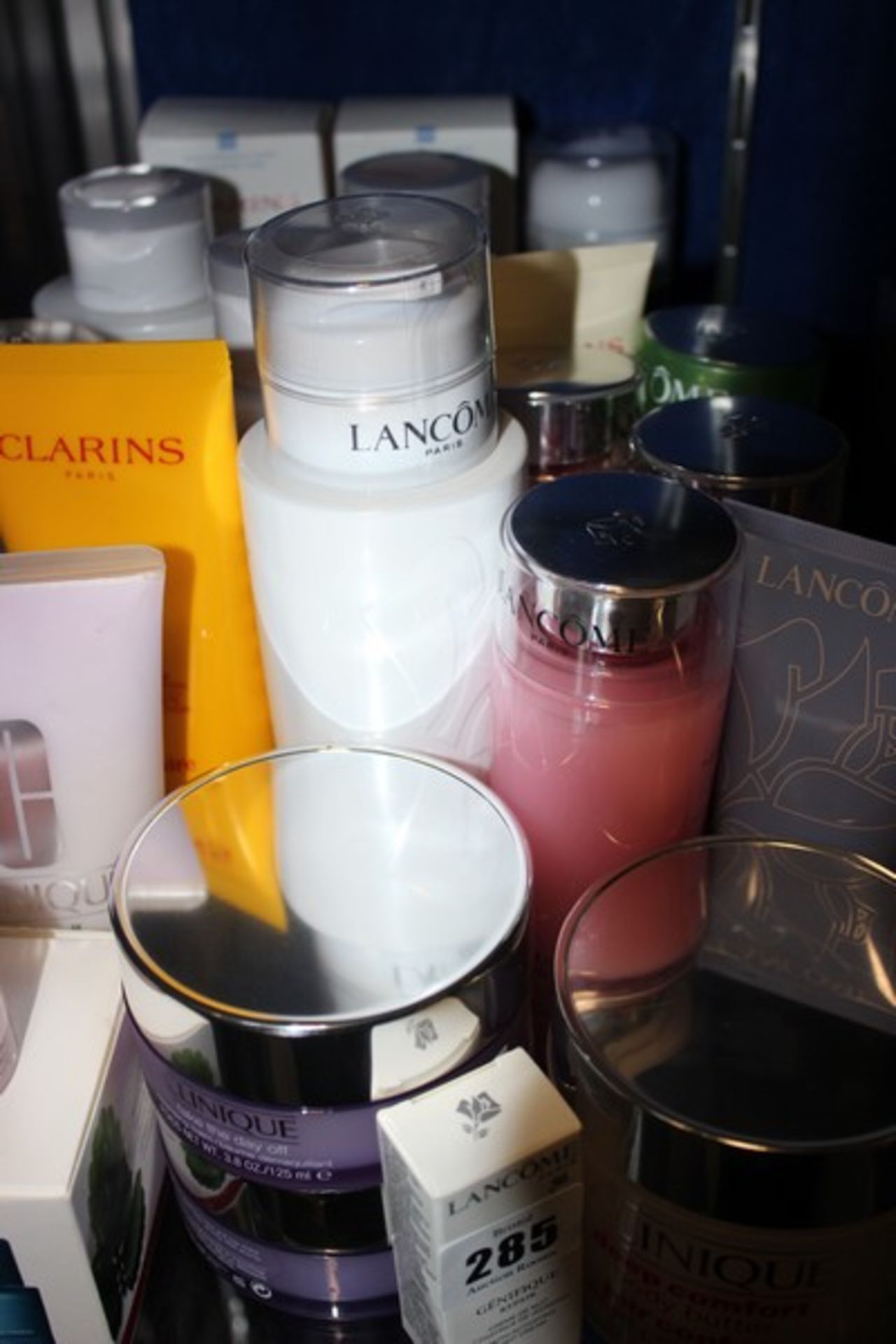 A quantity of Clarins, Lancome and Clinique beauty products (Approximately 20 items).