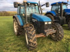 1999 New Holland TS115 4wd Tractor on 16.9R38 rear and 14.9R24 front wheels and tyres.
