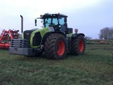 2014 Claas Xerion 5000 4wd tractor with front linkage on 900/65R42 Trelleborg wheels and tyres.