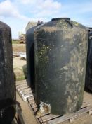 2 plastic liquid feed tanks