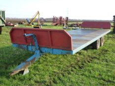 Henton steel body twin axle bale trailer on 12.5/80-15.3 wheels and tyres. Serial No. 1912.