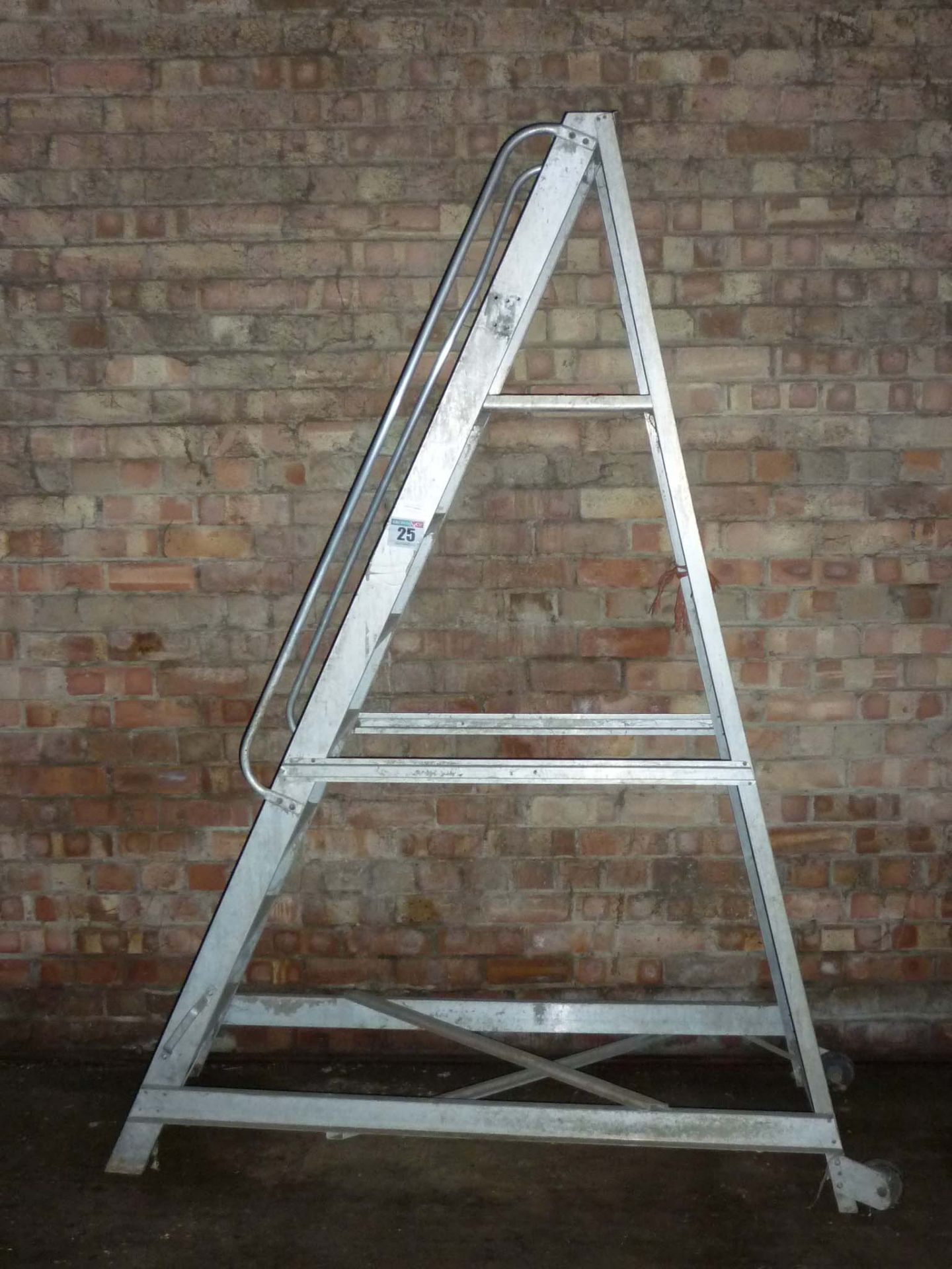 Frame mounted ladder on wheels
