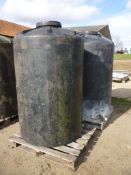 2 plastic liquid feed tanks