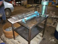 Steel bench with hydraulic pipe crimper and fittings