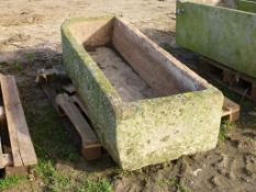 Large hewn stone trough