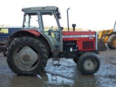 1991 Massey Ferguson 390 2WD tractor on 13.6-38 rear wheels and tyres. Reg No. J915 LTA.