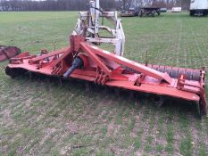 Kuhn HR4001 power harrow with rear packer roller and piggy back unit