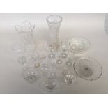 A small quantity of vintage glass together with a pair of cut glass vases 26 and 30cmH and a bowl