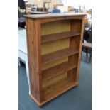 A modern pine bookcase with four shelves 87cmW