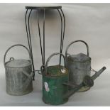 Three tin watering cans,