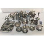 A quantity of silver plated and pewter items including a tankard, tea pot, coffee pot,